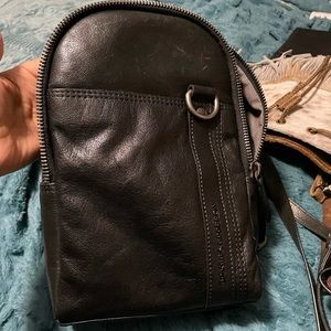 Spikes & Sparrow sling bag